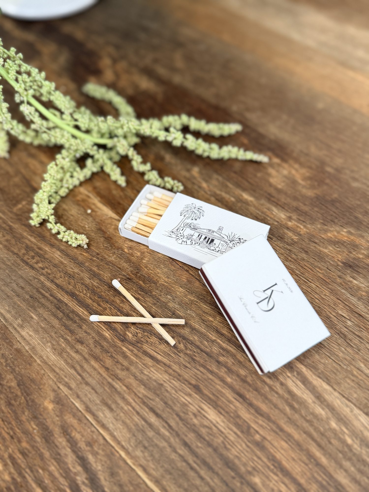 Custom wedding matchbox favors with venue illustration