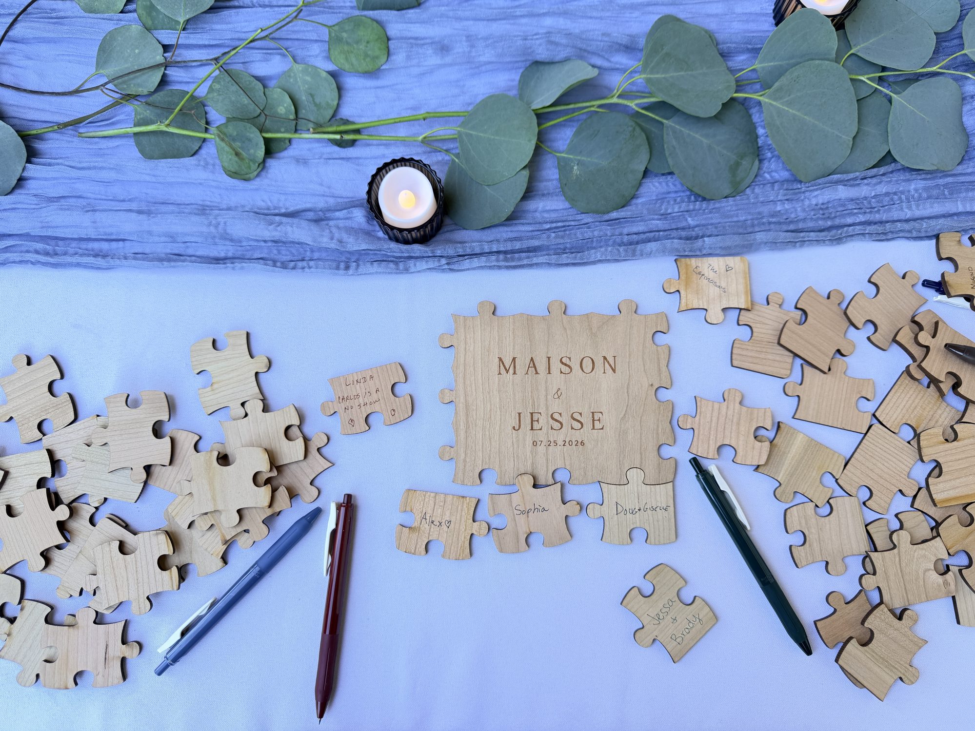 Wooden puzzle piece guest book for the newlyweds